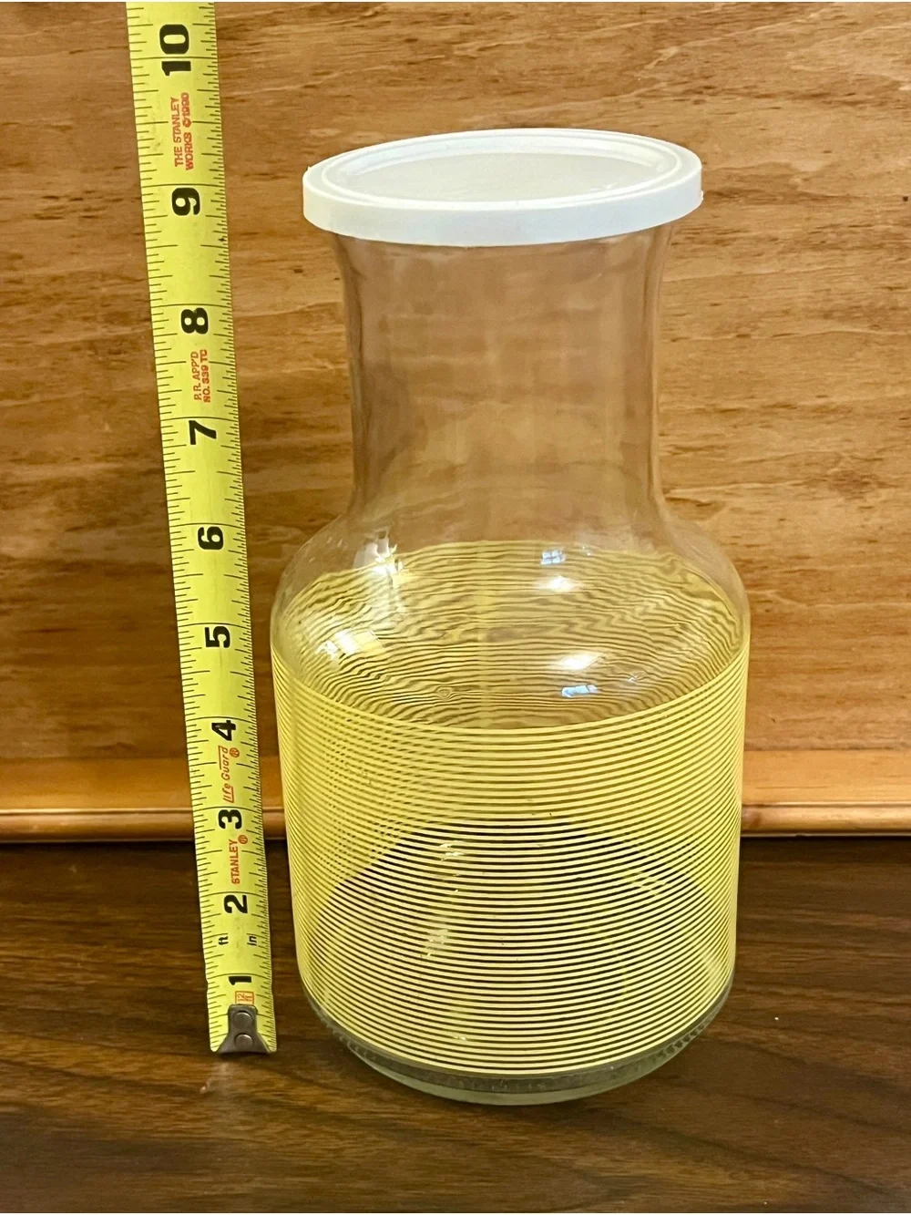 Clear Glass Carafe with Yellow Band and White Lid